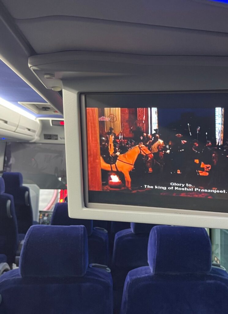 Divine Charter Bus Rental movie monitors on the bus
